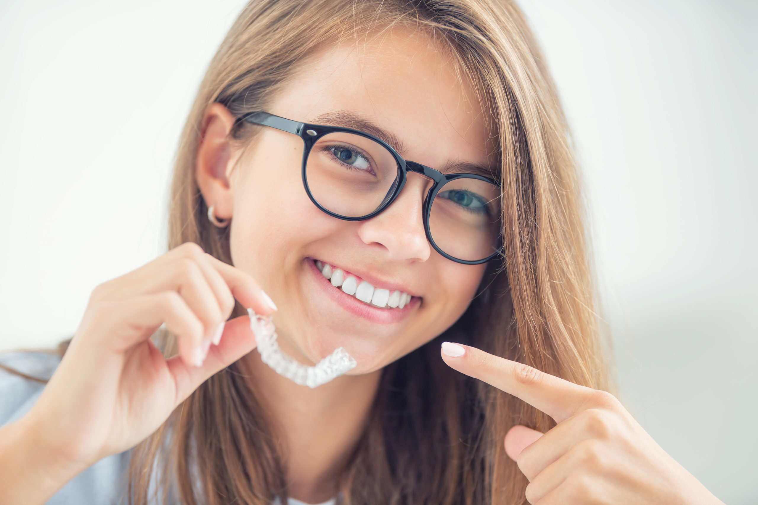 Pointing to Invisalign
